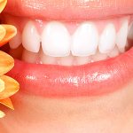 White teeth and flower