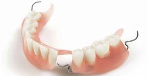 Частично-съемные зубные протезы