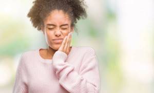 Перикоронит зуба мудрости: симптомы, причины, лечение
