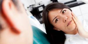 Почему возникает онемение после имплантации зубов